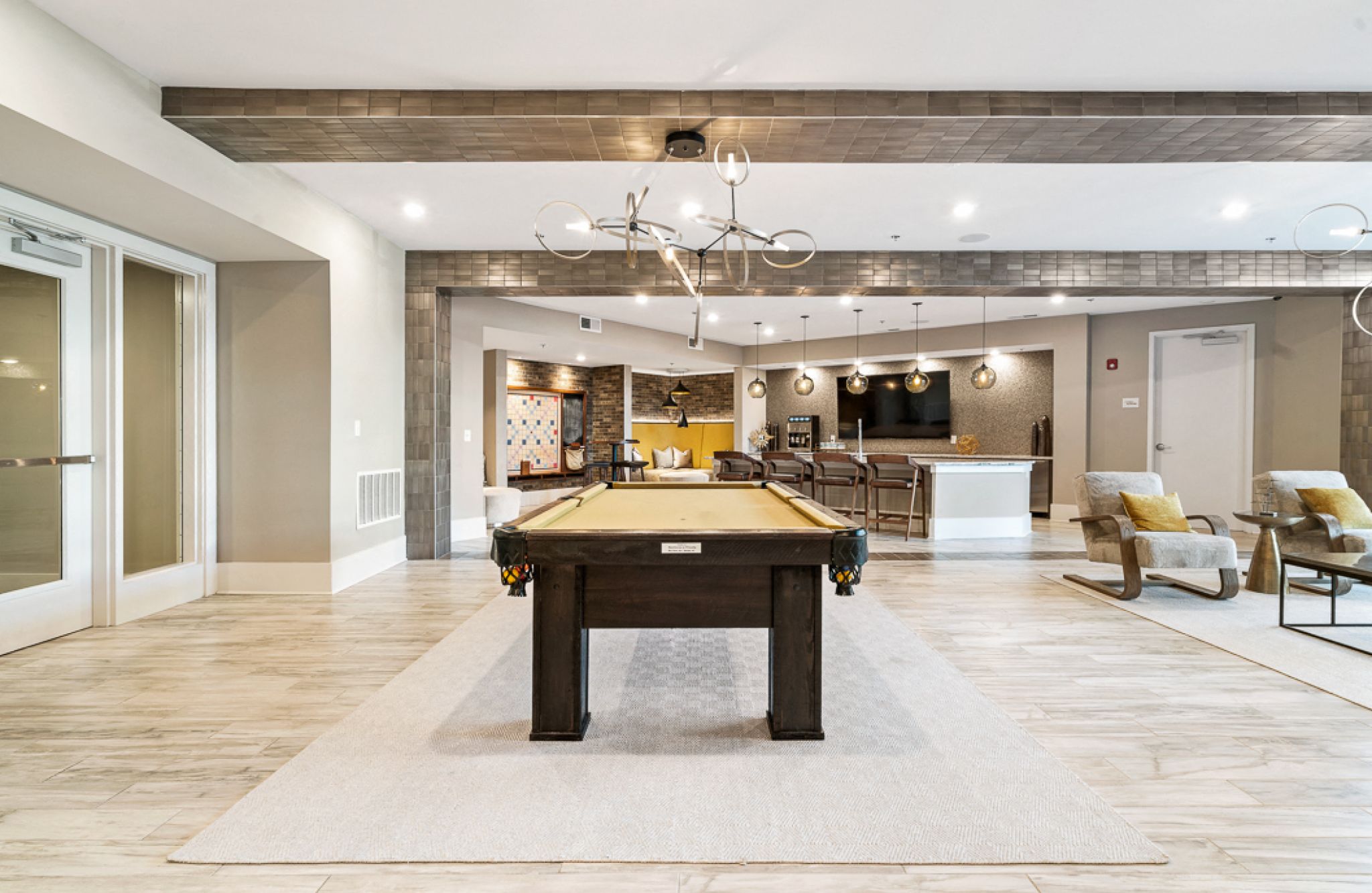 Hawthorne at Friendly amenity lounge area with pool table and entertainment space with kitchen